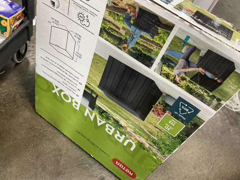 Condition photo showing As Is for keter urban 30 gal. outdoor deck box/storage table