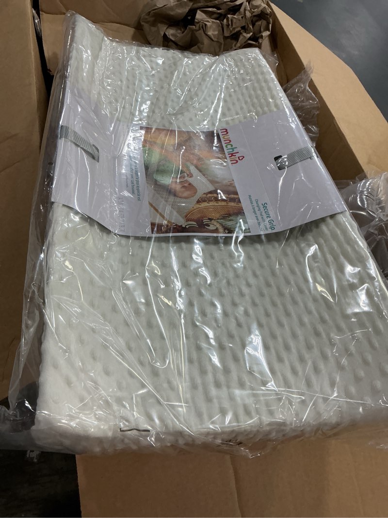 Condition photo showing New/Like New for munchkin secure grip baby diaper changing pad for dresser, waterproof and wipeable, contoured, standard size (14.75" x 31"), white
