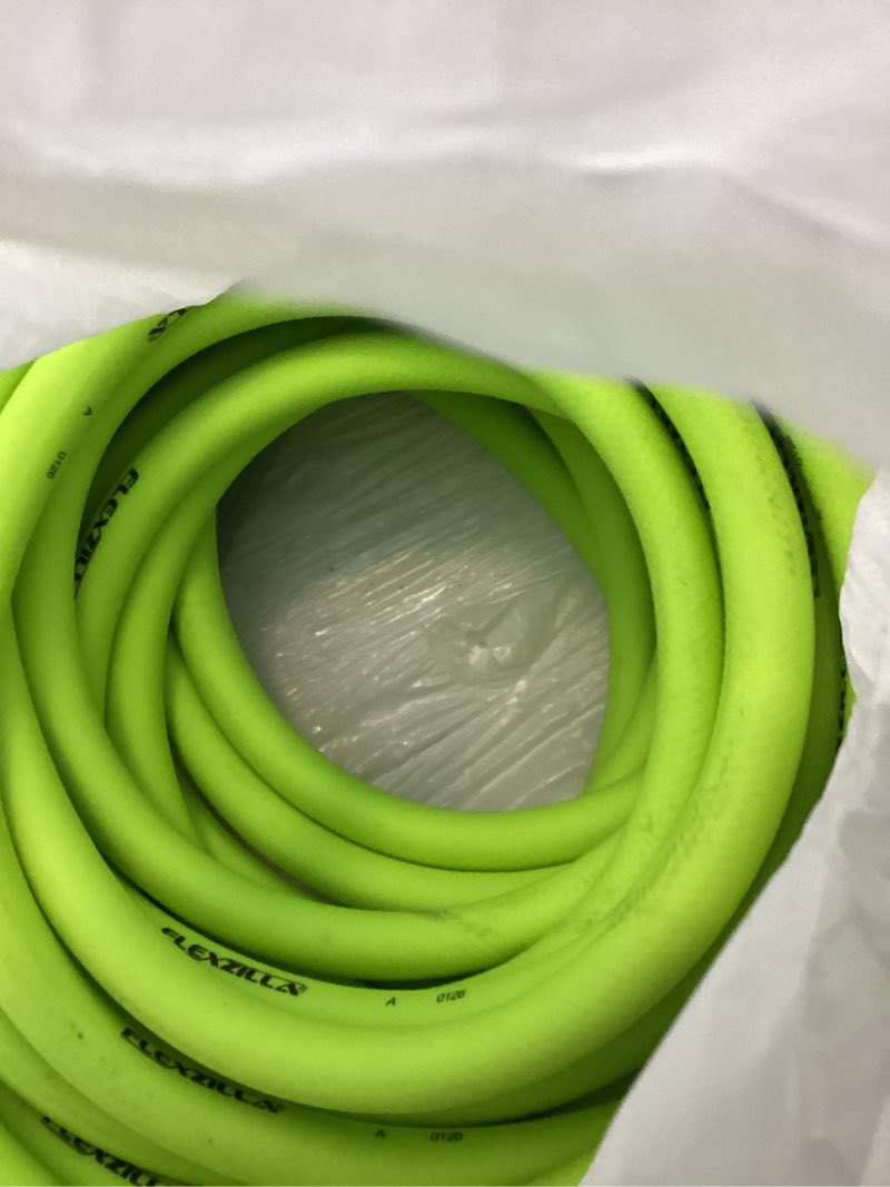 Condition photo showing As Is for flexzilla garden hose 5/8 in. x 75 ft., lightweight all-weather water hose, durable and flexible, leak-free connections standard grip 75ft chartreuse