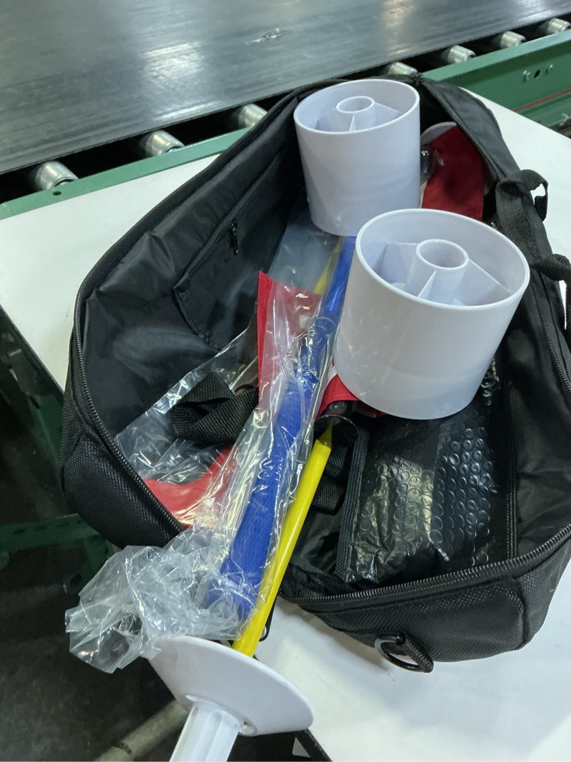 Condition photo showing New/Like New for mini golf course for beach backyard putting game, 2 adjustable putters, 2 golf flags & putting hole cups, 2 balls, 1 digger and 1 travel bag
