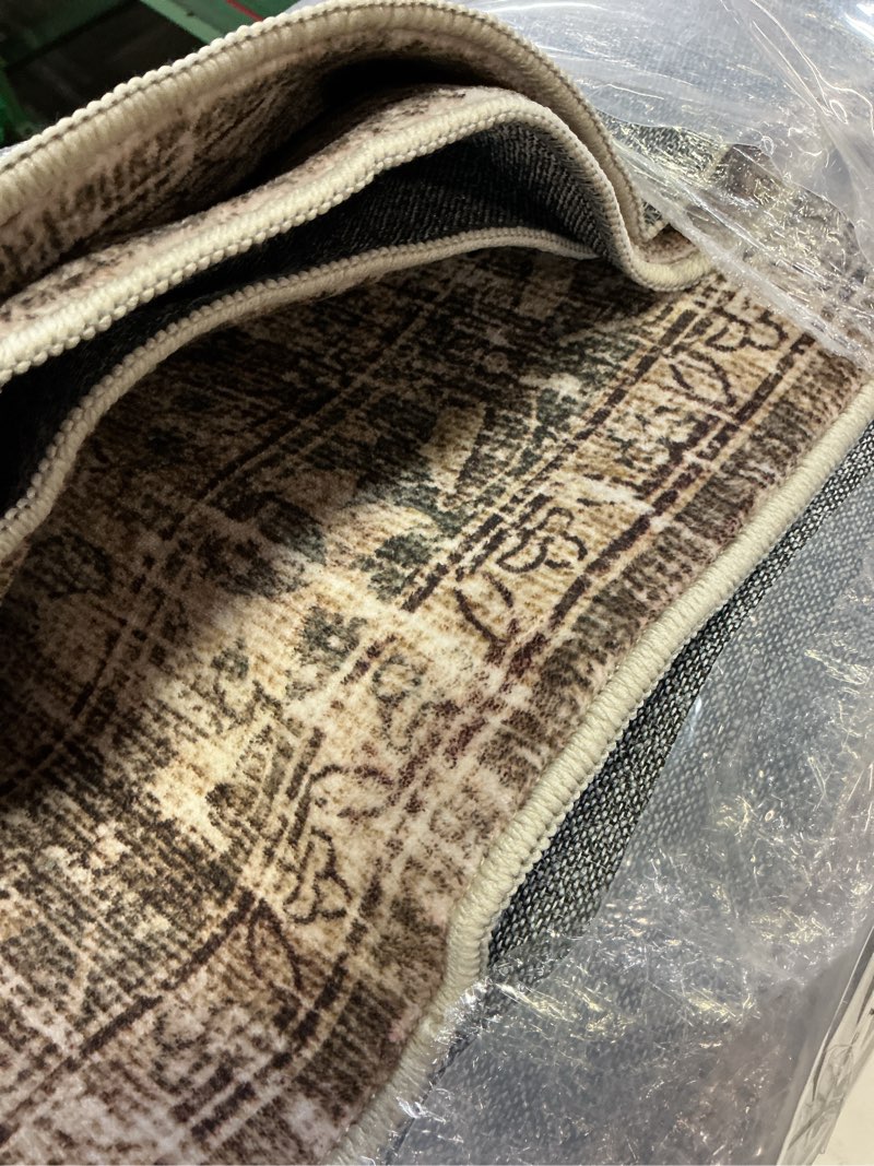 Condition photo showing Good Condition for purecozy area rug 9x12 brown machine washable non-slip vintage low plie thin living room bedroom dining room distressed carpet indoor large home office retro rug 9' x 12' (rectangular) accent | brown