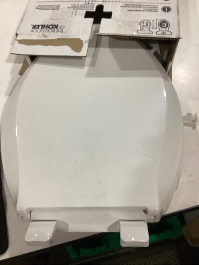 Condition photo showing As Is for kohler 4636-rl-0 cachet readylatch elongated slow close toilet seat, soft close toilet seat quiet lid, contoured grip-tight bumpers installation hardware, apartment essentials, white white elongated ready latch