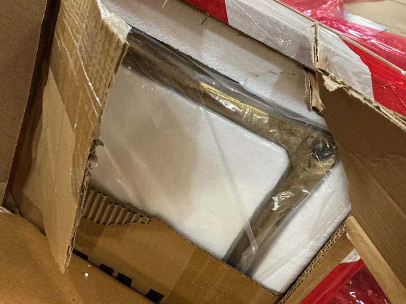 Condition photo showing Good Condition for Signature Design by Ashley Ryandale | Contemporary Accent Table – Glass Top, Aluminum Frame & Marble Shelf, Antique Brass Finish