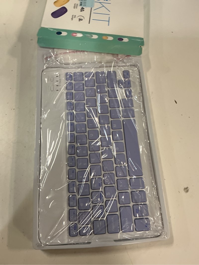 Condition photo showing New/Like New for innotechsc rechargeable mini bluetooth standard keyboard & mouse set with keyboard  mouse & charging cable  purple  new 1 pack