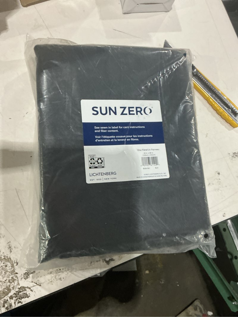 Condition photo showing New/Like New for sun zero bergen theater grade extreme 100% blackout rod pocket curtain panel, 40" x 96, black black 40"w x 96"l (pack of 1)