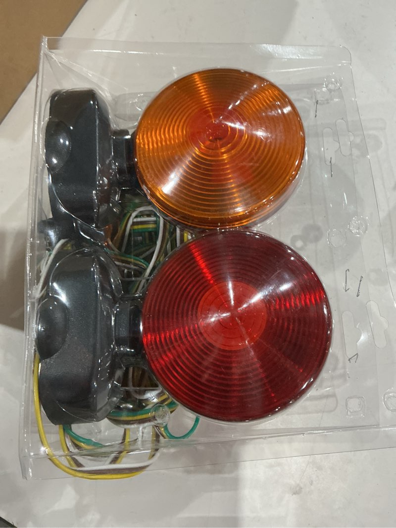 Condition photo showing As Is for (incomplete, missing pies)hopkins led submersible combination trailer light kit with integrated back-up lightse