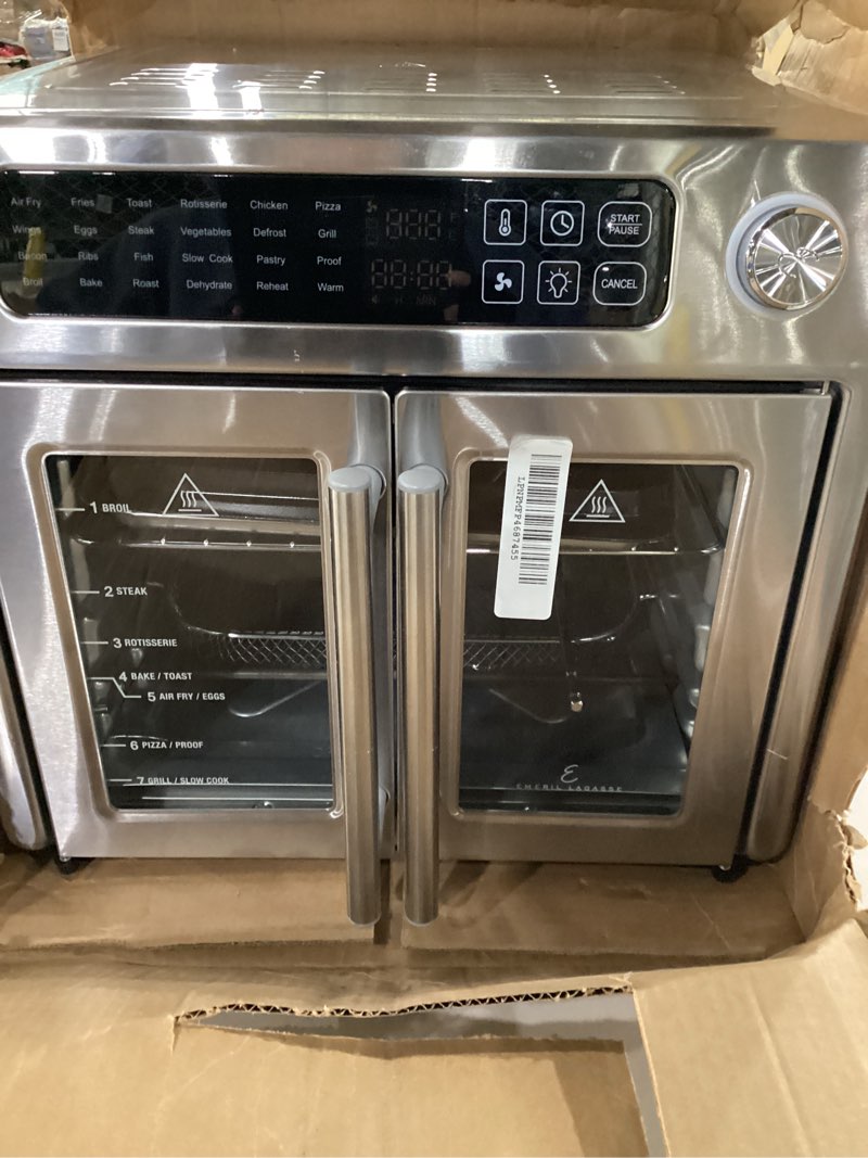 Condition photo showing As Is for Dan - Emeril Lagasse Extra Large French Door Air Fryer Toaster Oven Combo, 24 Cooking Functions and Digital Controls, 7 Accessories Included, Stainless Steel Finish, 26QT Capacity