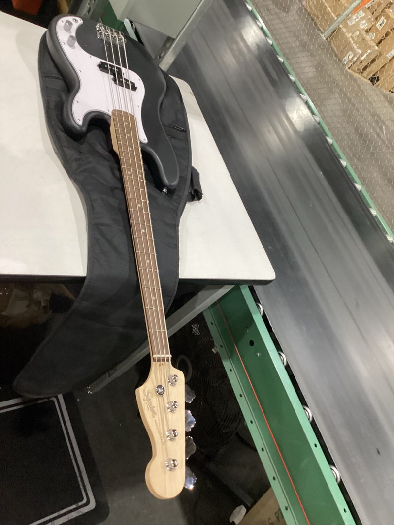Condition photo showing Good Condition for Fender Squier Debut Series Precision Bass Guitar Pack, Beginner Guitar Pack, 2-Year Warranty, Includes Rumble 15 Amplifier, Padded Gig Bag, Instrument Cable, and More, Black with Satin Urethane Finish Bundle Black
