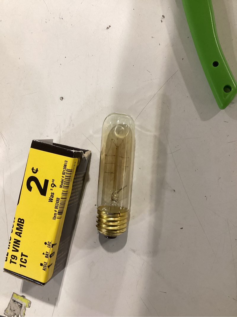 Condition photo showing As Is for 100+ bought last week GE Vintage Amber Glass 25 -Watt EQ T8 Warm candlelight Candelabra screw base E12 Dimmable LED Decorative Light Bulb Item #2626077 | Model #93129850