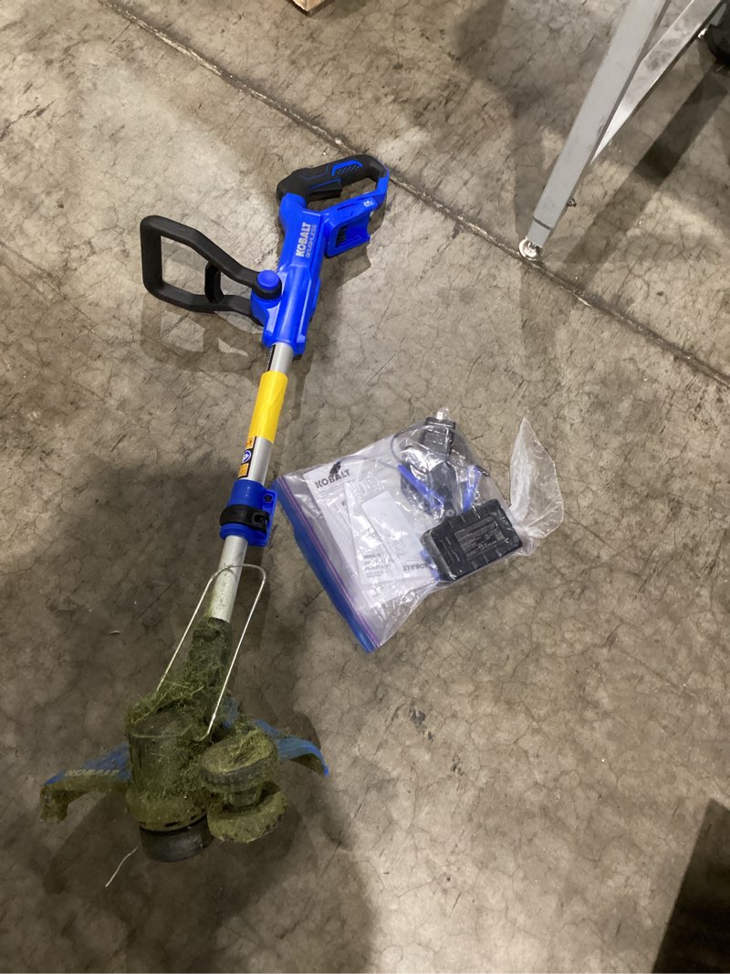 Condition photo showing As Is for 24-volt 12-in telescopic shaft battery string trimmer 3 ah (battery included) (charger included