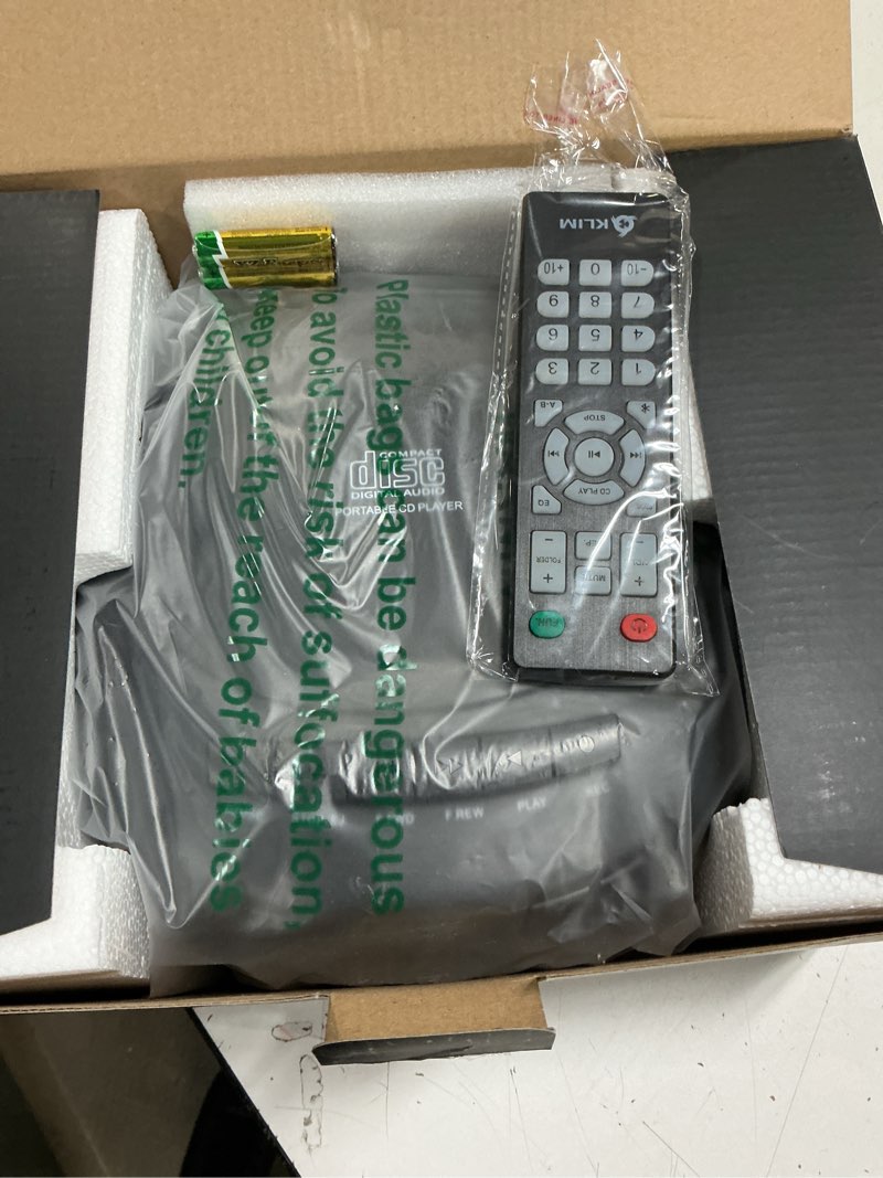 Condition photo showing New/Like New for KLIM CD Player & Cassette Tape Player with Case, Bluetooth Boombox, AM/FM Radio, Stereo Sound, Remote, CD and Cassette Combo, Tape Recording, USB Drive, AUX, AC/DC Powered