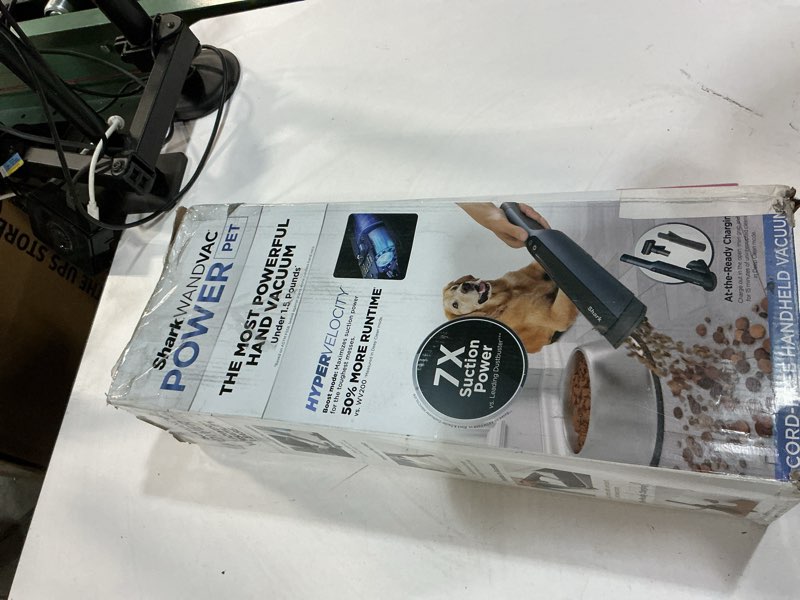 Condition photo showing As Is for shark wv410bl wandvac cordless hand vacuum, ultra-lightweight & portable with powerful suction & tools for pets, designed for car & home, dark blue