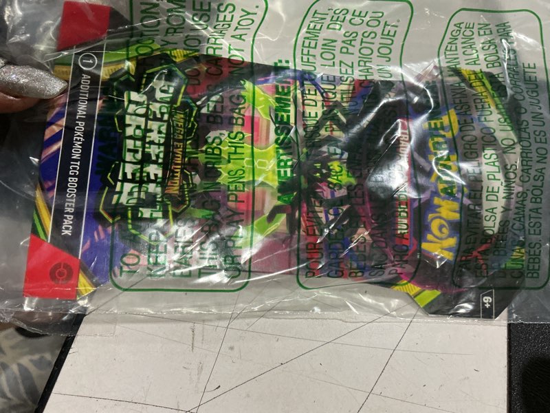 Condition photo showing Good Condition for pokémon tcg: mega evolution—ascended heroes mini tin: riolu & darumaka (1 sticker sheet, a pokémon art card & 2 booster packs)