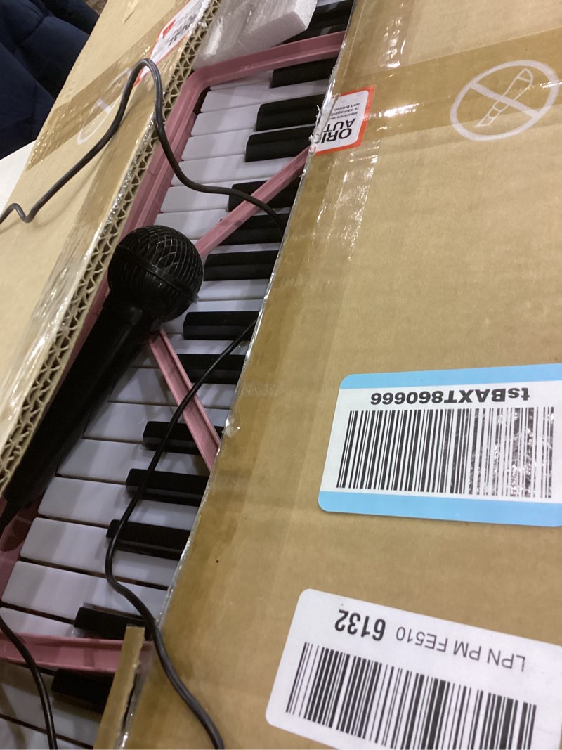 Condition photo showing As Is for Vangoa VGK610 Piano Keyboard, 61 Mini Keys Portable Music Keyboard for Beginners with Microphone, 3 Teaching Modes, 350 Tones, 350 Rhythms, 30 Demos, Pink 61 Mini keys pink