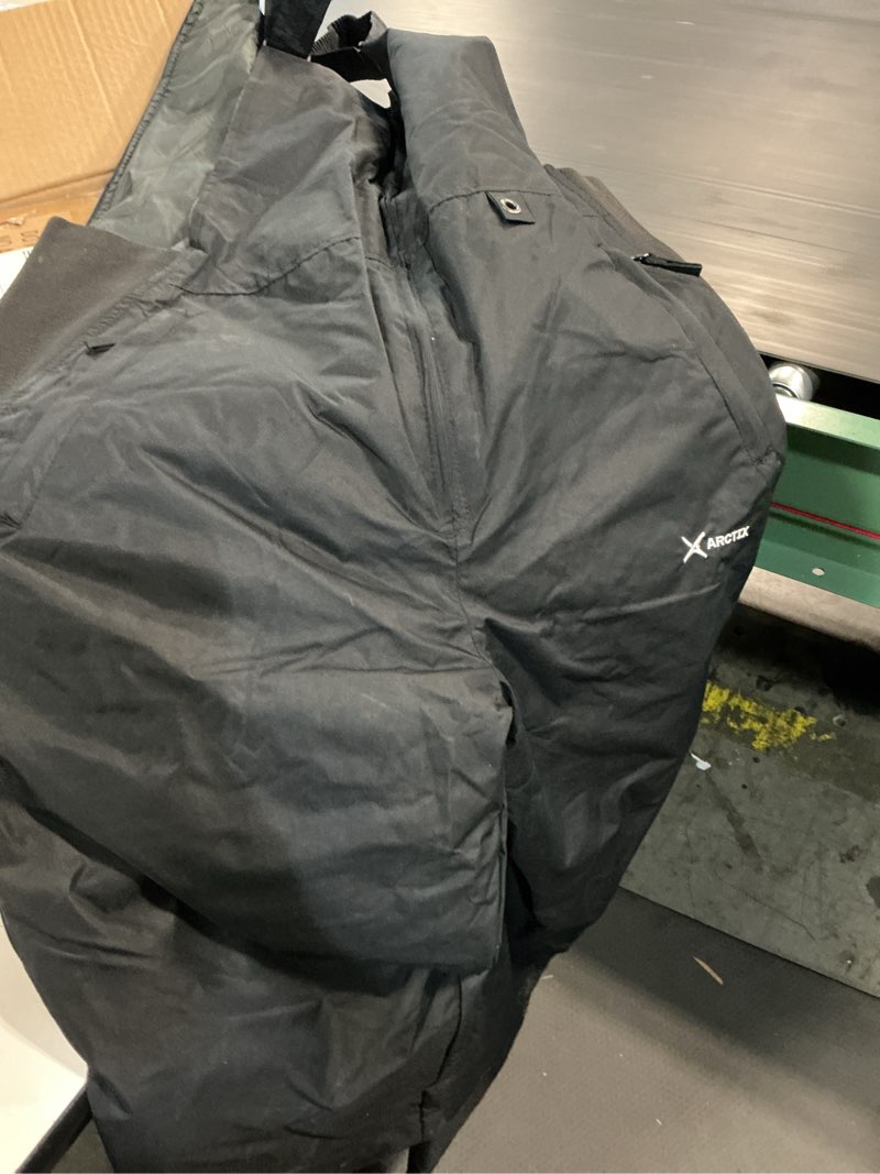 Condition photo showing Good Condition for arctix men's essential insulated bib overalls large/32" inseam black