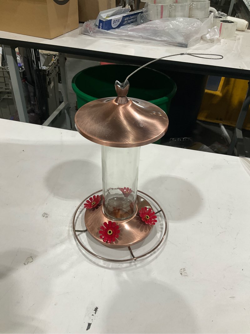 Condition photo showing New/Like New for glass hummingbird feeder, elegant copper