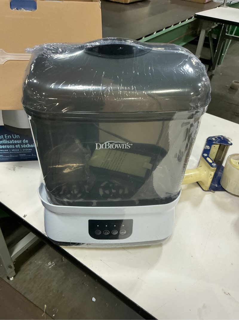 Condition photo showing New/Like New for dr. brown's all-in-one sterilizer and dryer for baby bottles, parts and other newborn essentials