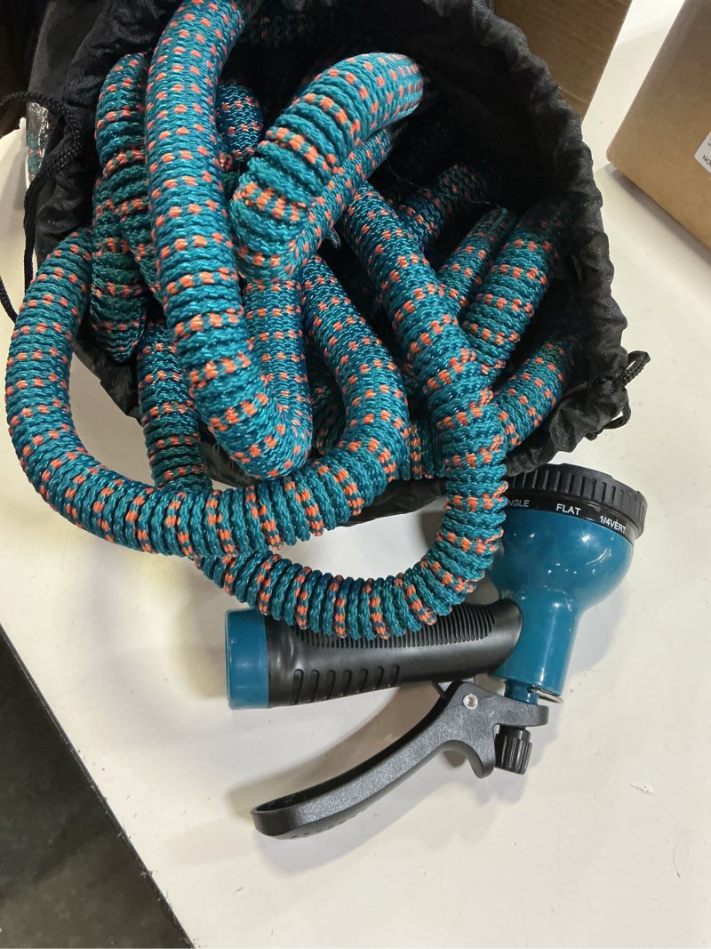 Condition photo showing As Is for 100 ft expandable garden hose, 2025 new retractable water hoses 100ft with 10 function spray nozzle,