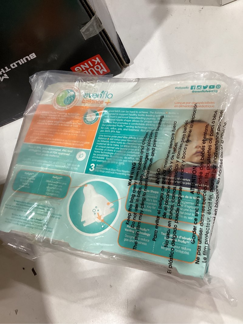 Condition photo showing New/Like New for evenflo feeding balance