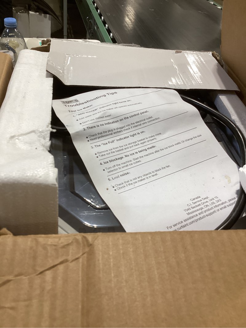 Condition photo showing As Is for frigidaire 26-lb ice per day bullet ice maker ( stainless )