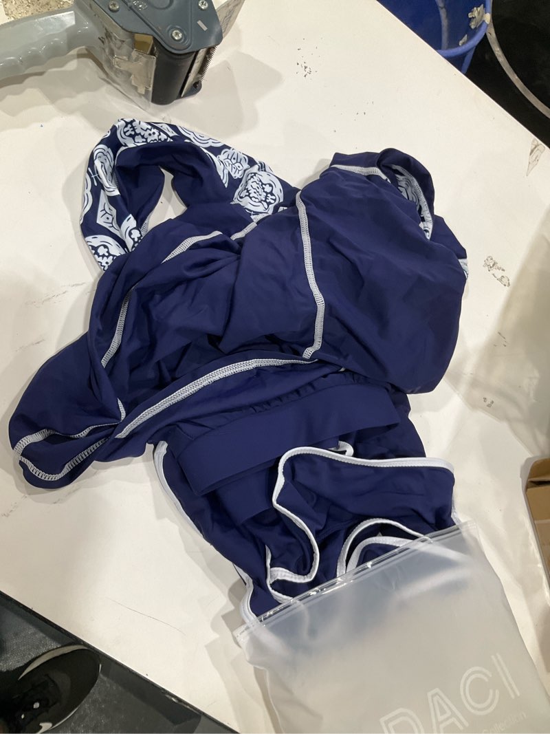 Condition photo showing Good Condition for daci long sleeves rash guard 2 piece swimsuits with shorts | two pockets,clolor block,high waisted short,sun protection,high neck,quick dry large navy geometric