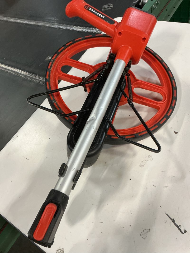 Condition photo showing As Is for crescent lufkin 12-in measuring wheel
