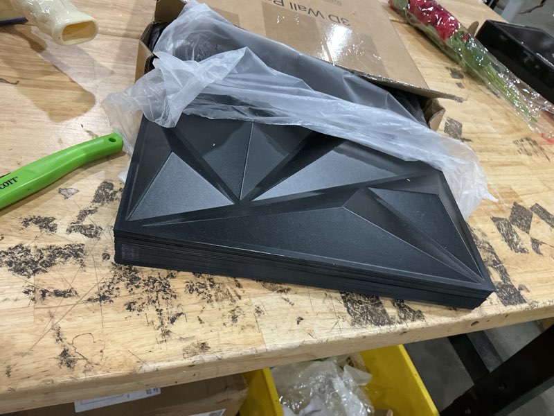 Condition photo showing Good Condition for art3dwallpanels 50 pack 3d wall panel diamond for interior wall décor, pvc flower textured wall panels for living room lobby bedroom hotel office, black, 12''x12'' 50 pack black 50