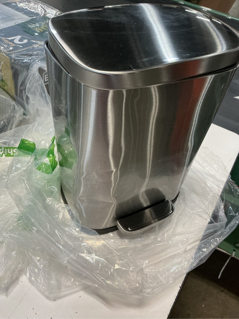 Condition photo showing As Is for amazon basics mini trash can, 1.32 gallon (5l) smudge resistant rectangular bin with soft-close lid, step foot pedal, removable inner bucket, brushed stainless steel, for bathroom, satin nickel finish satin nickel mini, 5l/1.32 gal