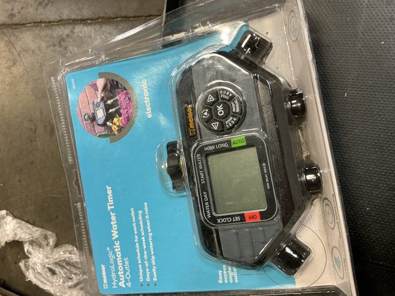 Condition photo showing As Is for melnor hydrologic programmable 4 zone digital water timer