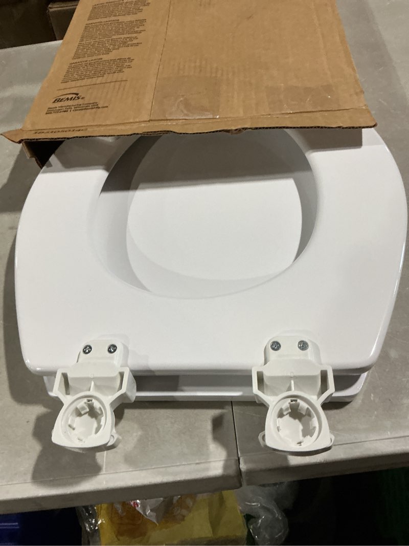 Condition photo showing As Is for bemis round enameled wood toilet seat in cotton white with easy•clean hinge