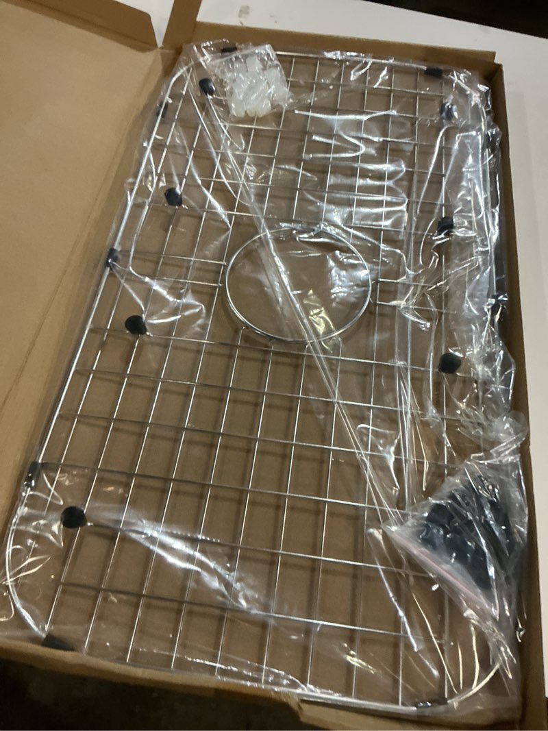 Condition photo showing New/Like New for Serene Valley Sink Protector Grid 26-1/16" x 14-1/16", Centered Drain with Corner Radius 3-1/2", 304 Stainless Steel Material NLW2614C