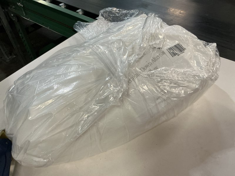 Condition photo showing As Is for premium down alternative pillow, standard, medium/firm