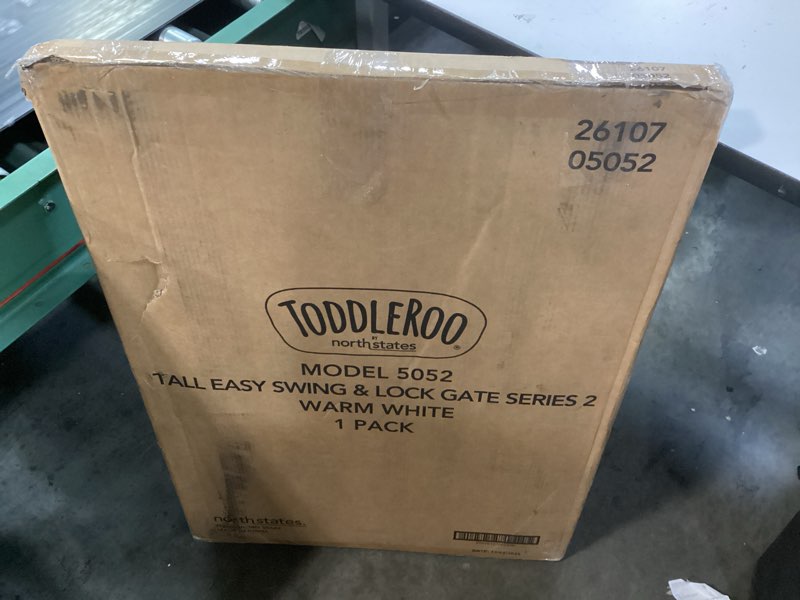 Condition photo showing New/Like New for toddleroo by north states - tall easy swing & lock baby gate series 2: metal safety gate for stairs & doorways - adjustable 28.68 to 47.85 inches wide - 36 inches tall - warm white