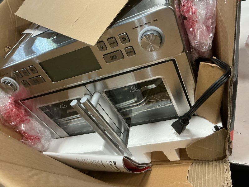 Condition photo showing As Is for emeril lagasse dual zone 360 air fryer oven combo with french door, 25 qt extra large, cook two foods in different ways, up to 60% faster from frozen to finish, pizza stone accessory