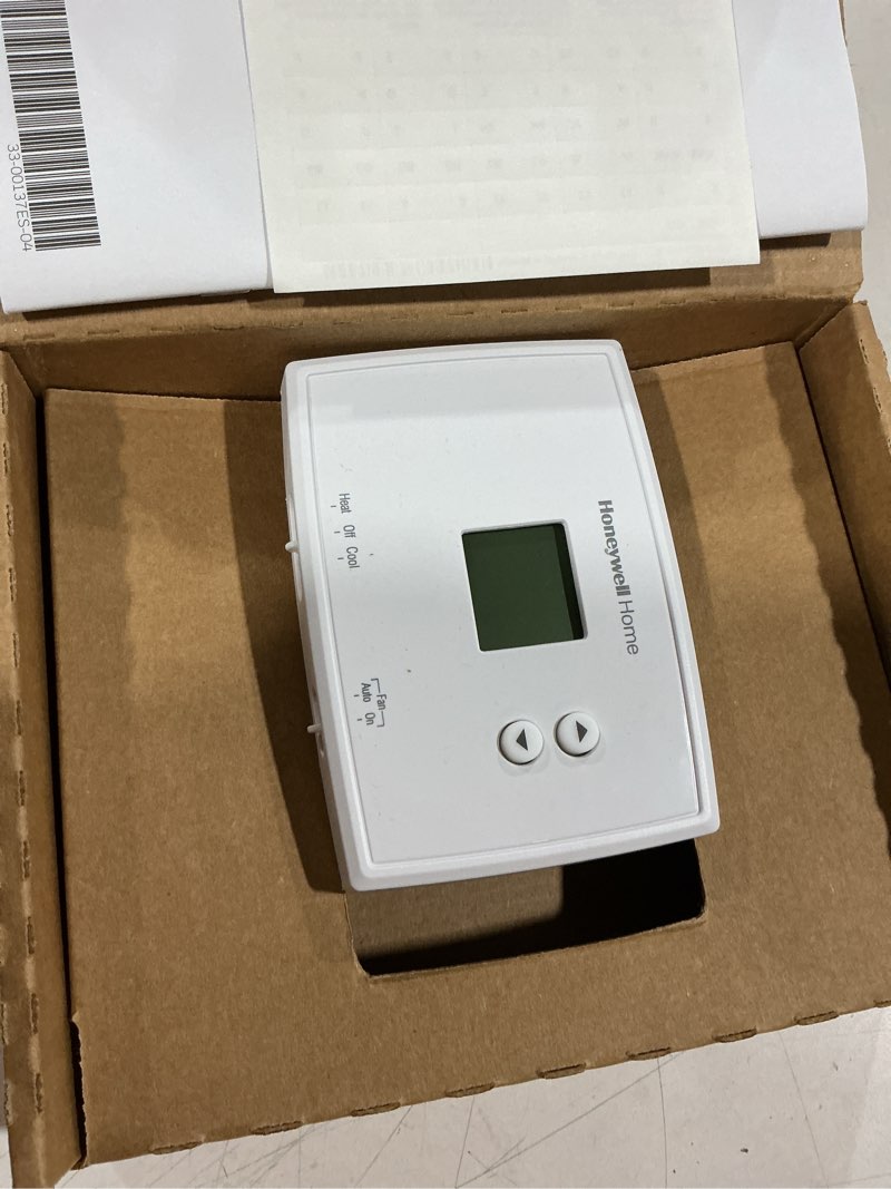 Condition photo showing As Is for honeywell home rth111b digital non-programmable thermostat