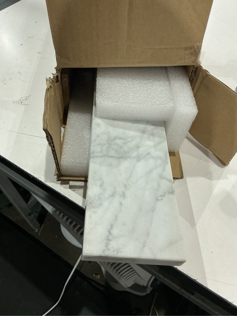 Condition photo showing As Is for allen + roth 4-in h x 21-in l italian carrara natural marble bathroom side splash