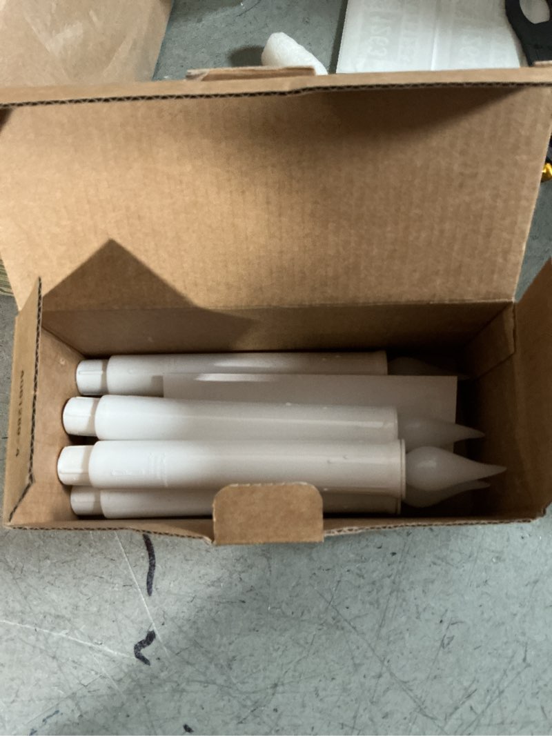 Condition photo showing New/Like New for suraielec battery operated window candle with 6h timer, 10.5'' taper xmas window candle, clear white flameless led candles, 1.7‘’ narrow base, gloss gold, 4-pack
