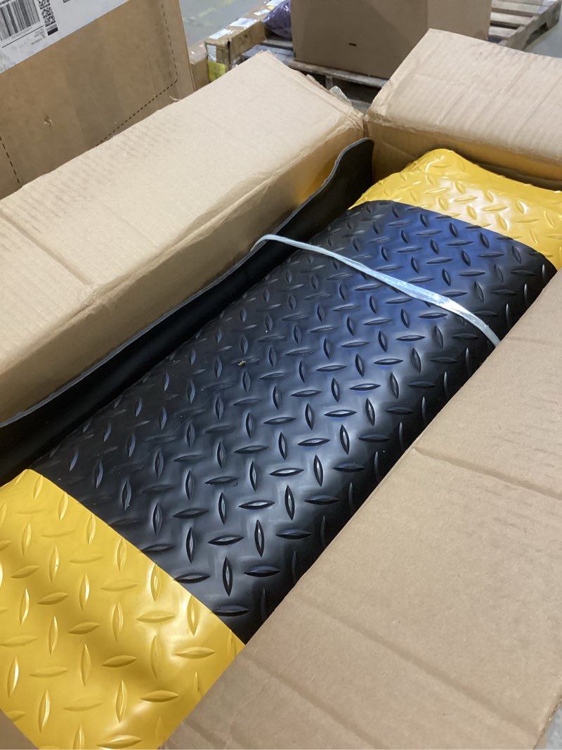 Condition photo showing Good Condition for anti fatigue mats industrial 2' x 7' 15/16" thick ergonomic standing mat commercial kitchen mat heavy duty diamond plate shop floor mat helps relieve back and leg soreness 2' x 7' yellow border
