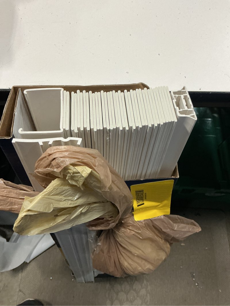 Condition photo showing As Is for levolor trim+go 2-in slat width 34-in x 64-in cordless white faux wood room darkening horizontal blinds