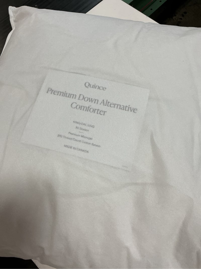 Condition photo showing New/Like New for premium down alternative comforter cal king