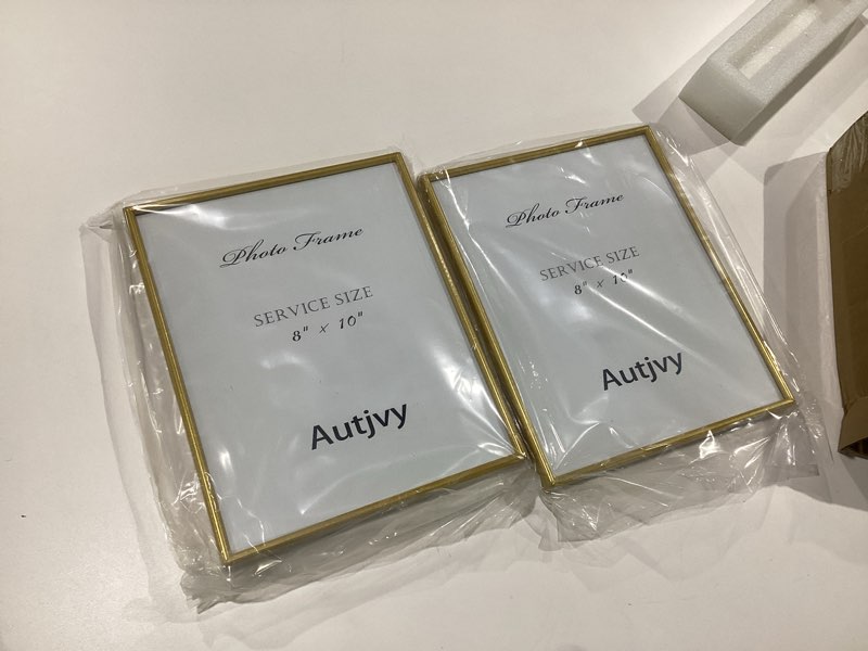 Condition photo showing Good Condition for upsimples 8x10 Picture Frame Set of 2, Made of High Definition Glass for 8 x 10, Wall and Tabletop Display Thin Border Photo Frames for Home Decor, Gold Gold 8x10, SIMILAR TO STOCK PHOTO 