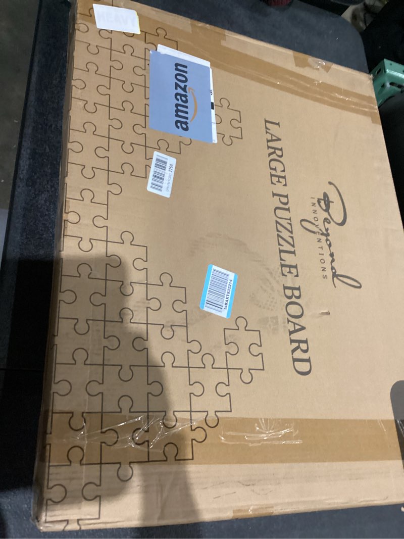 Condition photo showing Good Condition for 1000 Piece Rotating Puzzle Board with Drawers and Cover - 4 Drawers, Wooden Jigsaw Puzzle Table | 30” X 22”| Jigsaw Puzzle Board - Portable Puzzle Tables for Adults and Kids by Beyond Innoventions