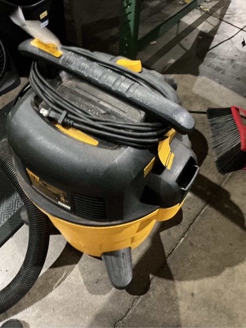 Condition photo showing As Is for dewalt stealthsonic quiet 12-gallon 5.5 hp corded wet/dry shop vacuum with accessories