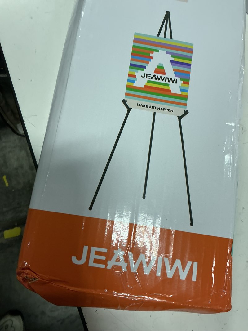 Condition photo showing New/Like New for jeawiwi 3pcs black easel stand for wedding signs, 66 inch adjustable display easel, lightweight metal poster stand for wedding, art display & signs with portable bags black 3 pcs