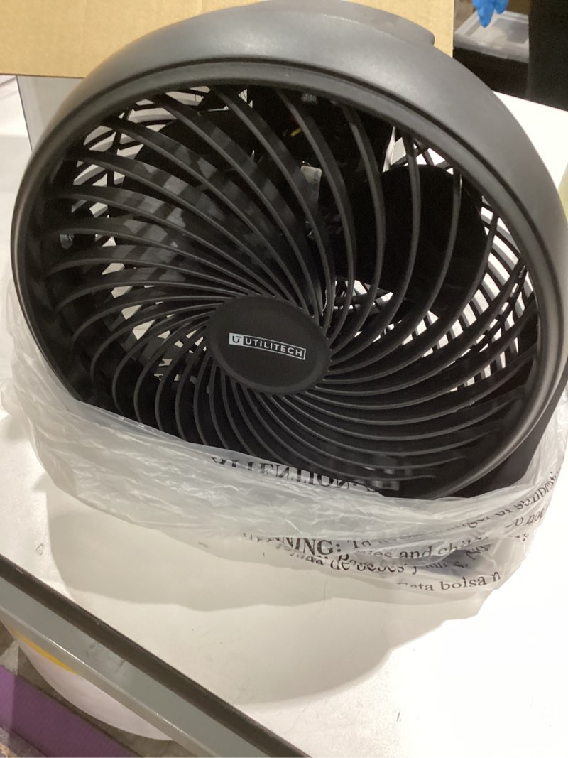 Condition photo showing Good Condition for amazon basics air circulator fan, desk fan for bedroom, home and office, with 90-degree tilt head, 3 speed settings, lightweight (4.2 lbs), 70 watts, black, 14.8"wx7.6"dx14.1"h 14.8"w x 7.6"d x 14.1"h