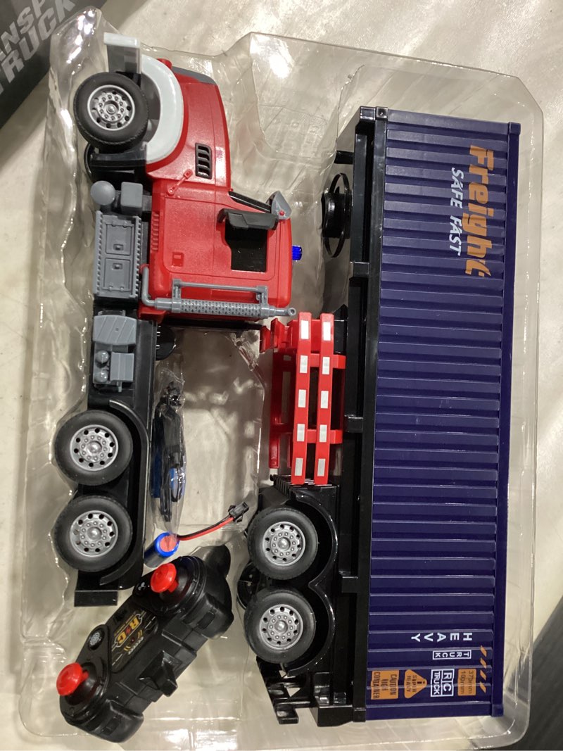 Condition photo showing New/Like New for RC Semi Truck with Trailer - 22.5 Inch Semi Truck Toy for Kids, Carrier Van Transport Vehicle with 2 Rechargeable Batteries, 1:24 Container Trucks with LED Lights & Music, Great Gift For Boys Girls