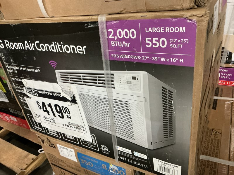 Condition photo showing New/Like New for lg 12,000 btu 115v window air conditioner cools 550 sq. ft. with wi-fi, and remote in white