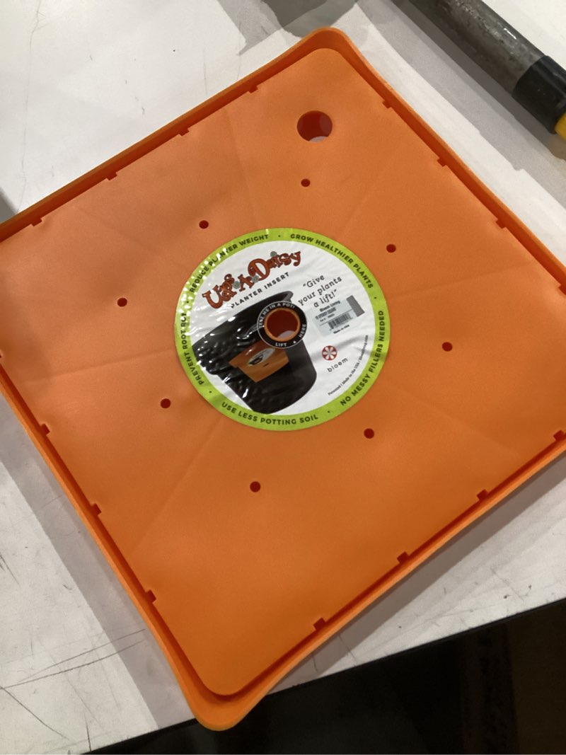Condition photo showing New/Like New for bloem ups-a-daisy square planter insert - 14.75" width x 1" thick | soil-saving insert with drainage holes for square planters; typically fits into planters between 19 to 21 inches wide. orange 15" (pack of 1)