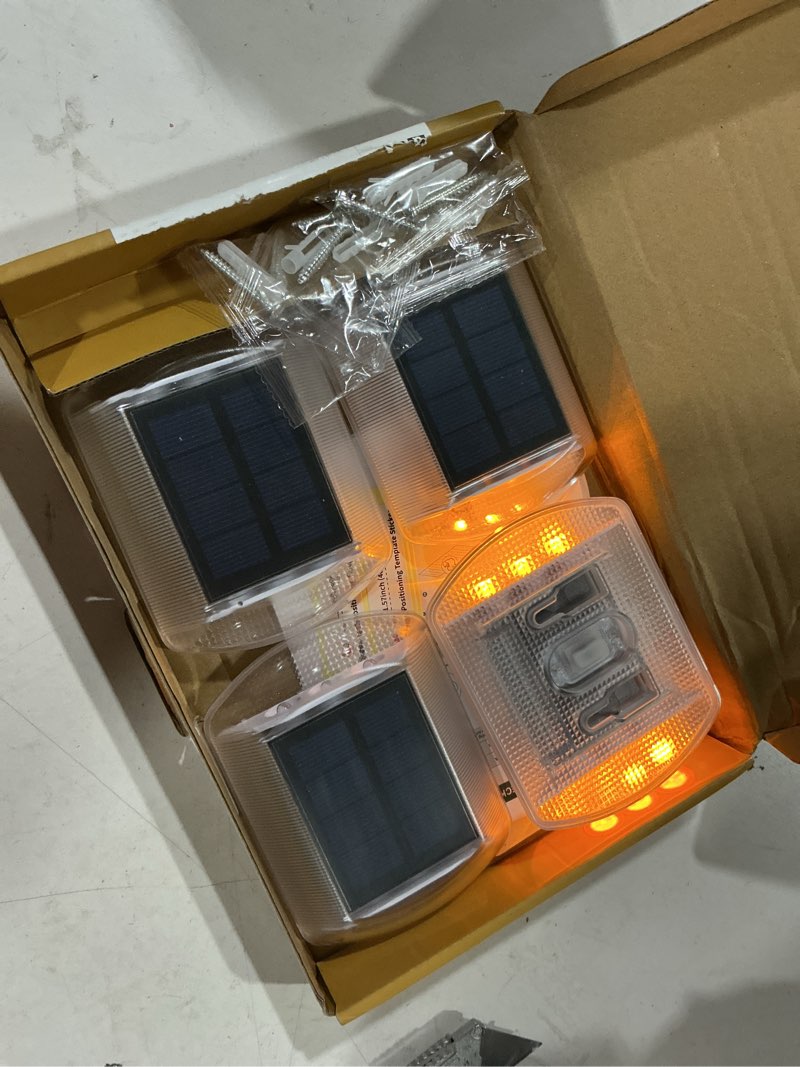 Condition photo showing Good Condition for detarzinled solar deck lights outdoor, 4 pack warm driveway lights solar powered, ip68 waterproof stick on & screw dock light for pathway, walkway, sidewalk, patio, pool deck, garden, step amber warm 4 pack