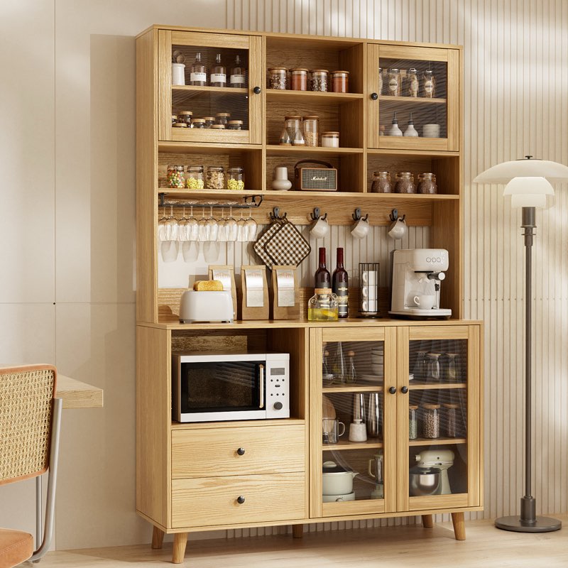 kitchen pantry with glass door and microwave shelf
